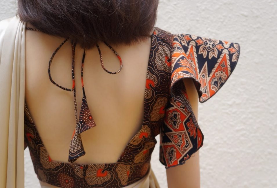 The exquisite back design of a tailored batik saree blouse