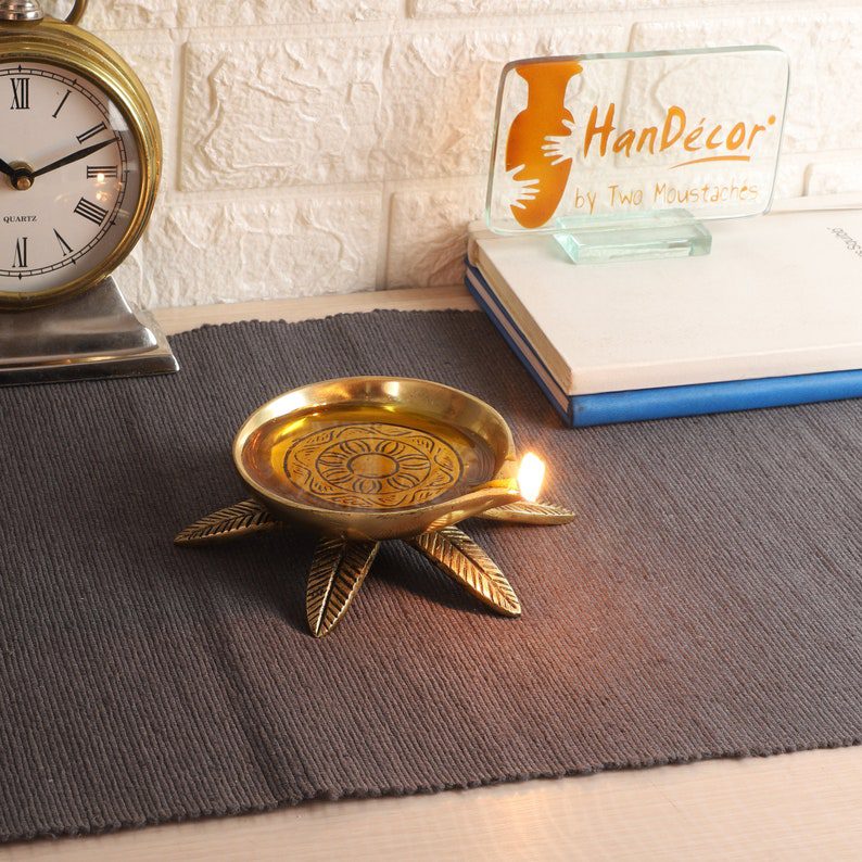 brass oil diya bowl with leafy base // TwoMoustaches